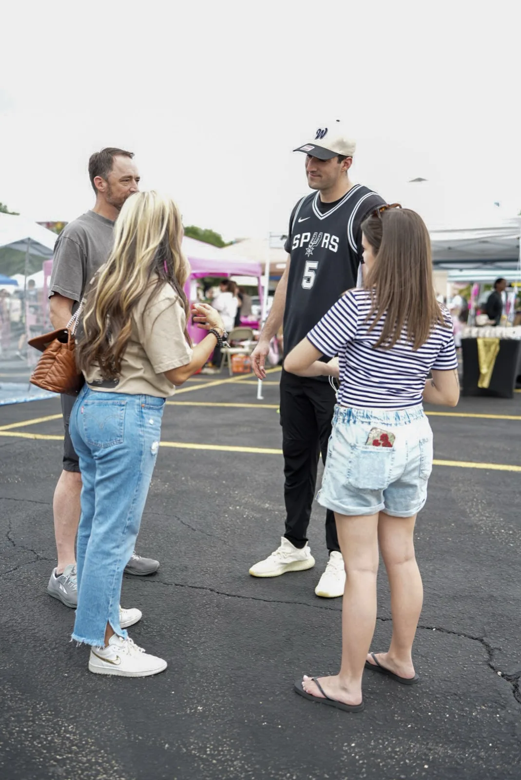 Families and friends mingling at Holy City Market.